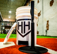 Home Run Hero batting tee and bucket close up