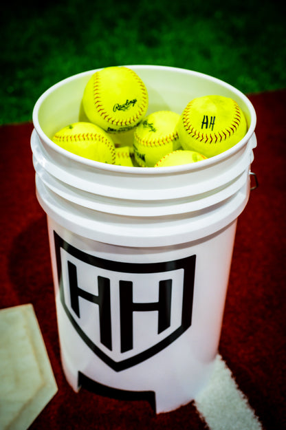 Home Run Hero ball bucket full of softballs